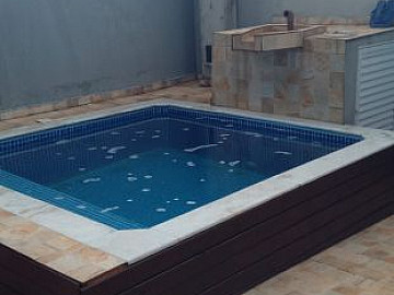Casa de 125m� com piscina a venda em Itanha�m -SP.