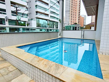 Apartamento de 97m�, 2 quartos, garagem e piscina.